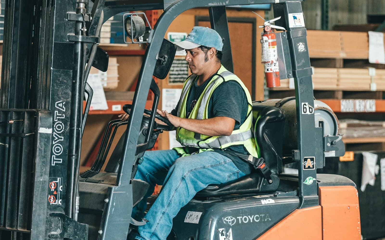 Forklift operating outside an industrial workshop in Mussafah, Abu Dhabi